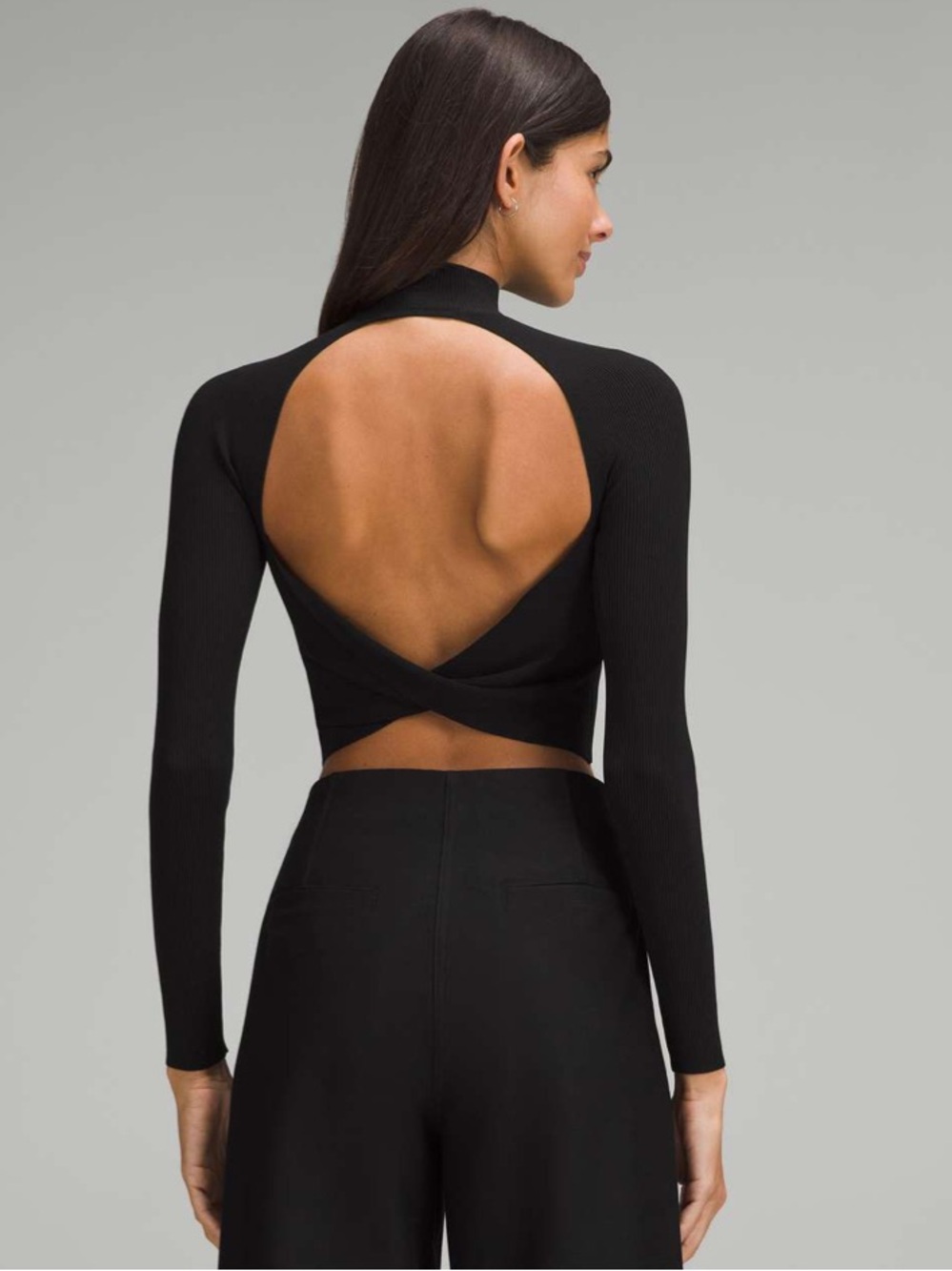 Like New  Lululemon Ribbed-Knit Twist-Back Mockneck Sweater. Color Black. Size M
